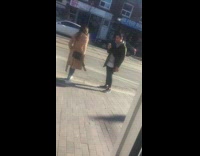 Brown coat YSL purse black SUV girl