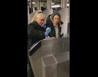 Mother daughter attempt to enter station together 