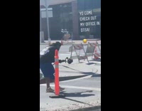 White hard hat girl dances construction site 