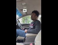 Guy drivers seat car mom grocery store