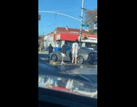 Car got stuck at curbside then reversed 