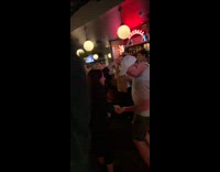 Couple dances at bar during Shallows song