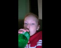 Red sweater girl green bottle big lips 