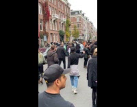 Man selfie stick dance video at protest