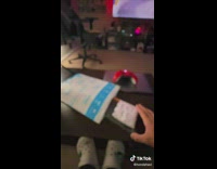 Guy showing off new chicken legs workout socks