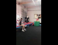 girl back flips in trampoline folds