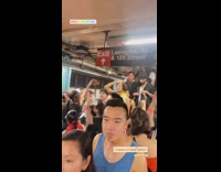 People in rave outfits cheer and dance 