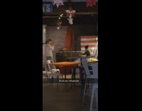 Girl sits at bar with music and takes pictures