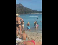 Woman blue bikini blanket twerk in the middle of the beach
