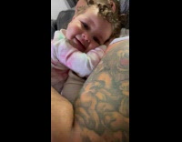 Baby Giggles as Lady Plays with Her