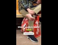 Woman ride train crossed leg with feet out