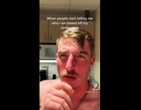 Guy shirtless camera slowly zooms to face 