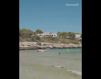 Guy floats plays dead in water