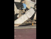 Marching bandmate goes marching on a statue 