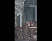 Guy open checkered sleeves headphones dance balcony