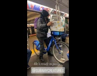 Guy on subway with white claw boxes 