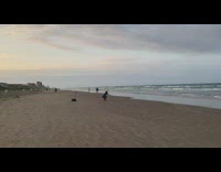 Woman Captain America costume workout beach