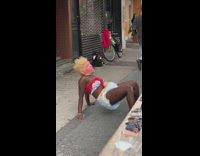 Lady trump mask diaper dances sidewalk crystals 