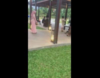 women under gazebo park selfie