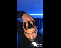 Guy head transition black shirt blue lights 