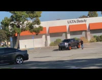 Man orange smoke bomb truck photo shoot parking lot