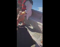 Women on boat run into water waves 