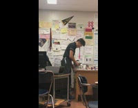 Teacher balances point on top of pen and three markers students unimpressed