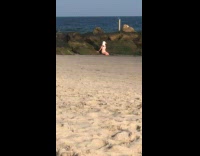 Man and Woman seagull helmet at beach