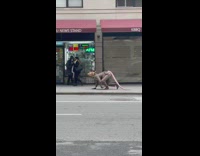 Rat costume guy chases girl down sidewalk 