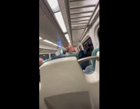Two men argue fight in subway train