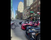 Sports cars and drivers wait at stoplight in NY 