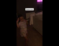 Collab PubityPets - Kid purple shirt white short dancing in the living room 