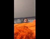 Kid emerges and looks at the filmer