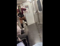 Woman wearing bodysuit twerks on train ride