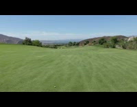 White shirt guy hits golf ball far 