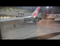 Airport employee guy throws stacks traffic cone 