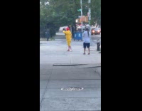 Weird McDonald costume filmed on the street