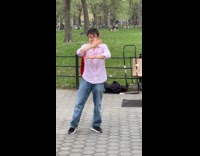 Man dancing to drummers performance