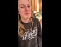 Baby spits up on girl 