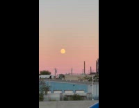 Collab WINY - Visible yellow full moon on sunset sky