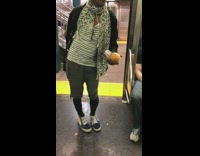 Guy catches dragonfly on the subway
