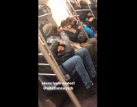 Guy vapes through face mask on subway 