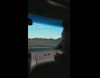 Guys blast music while driving by jogger