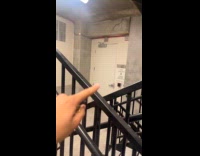 Man confused by stairs design on building