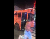 Knicks themed bus rolls around the street