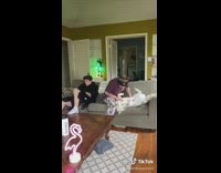 Flip switch guy pets white dog 