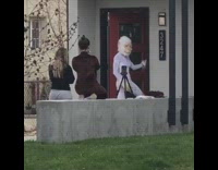 Girl white monkey mask costume red door