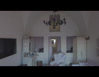 slow motion drone from hotel to santorini city