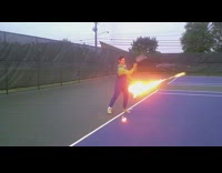 Two guys dressed up as Mario and Luigi play tennis with tennis ball on fire