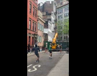 Collab WINY - Four people play pickleball on street crane